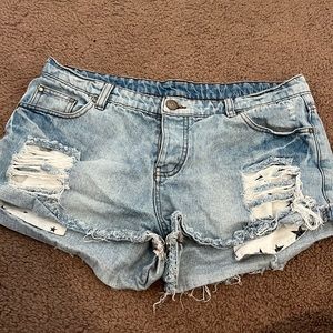 Denim shorts with star pockets